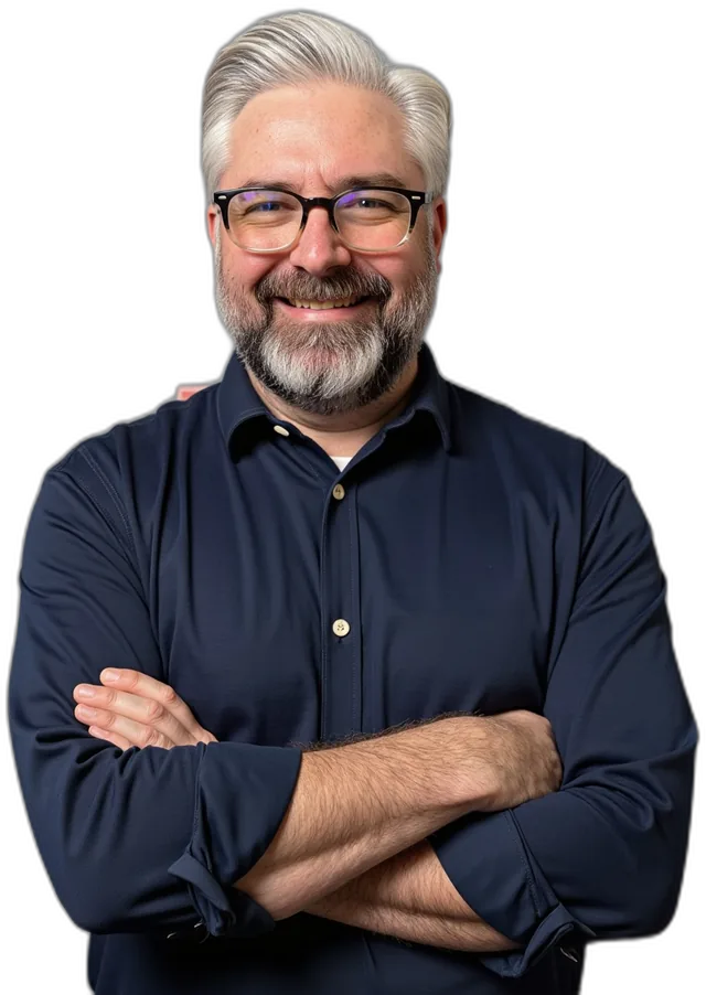 Jeremy Kenerson, Founder and CEO of DeskTeam360, arms crossed and smiling